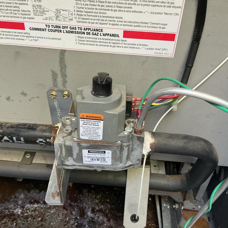 Gas control valve on pool heater with wiring connections
