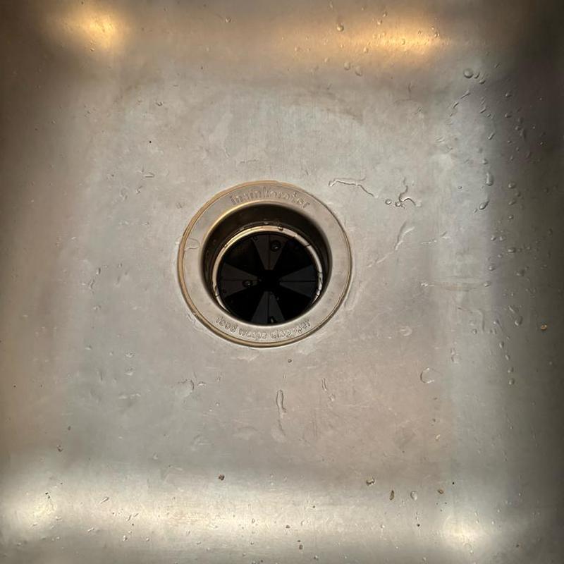 Kitchen sink drain mount with new disposal installed