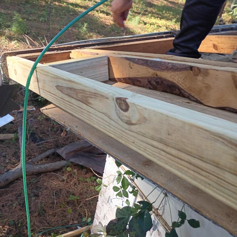 Roof wood framing with new lumber installation