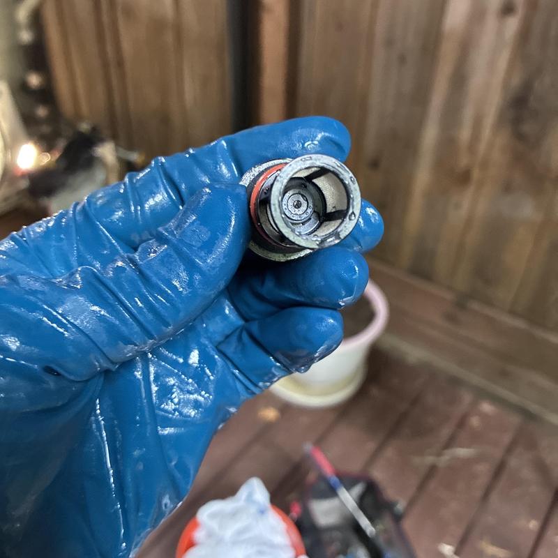 Tankless water heater igniter removed for cleaning Tankless water heater igniter removed for cleaning
