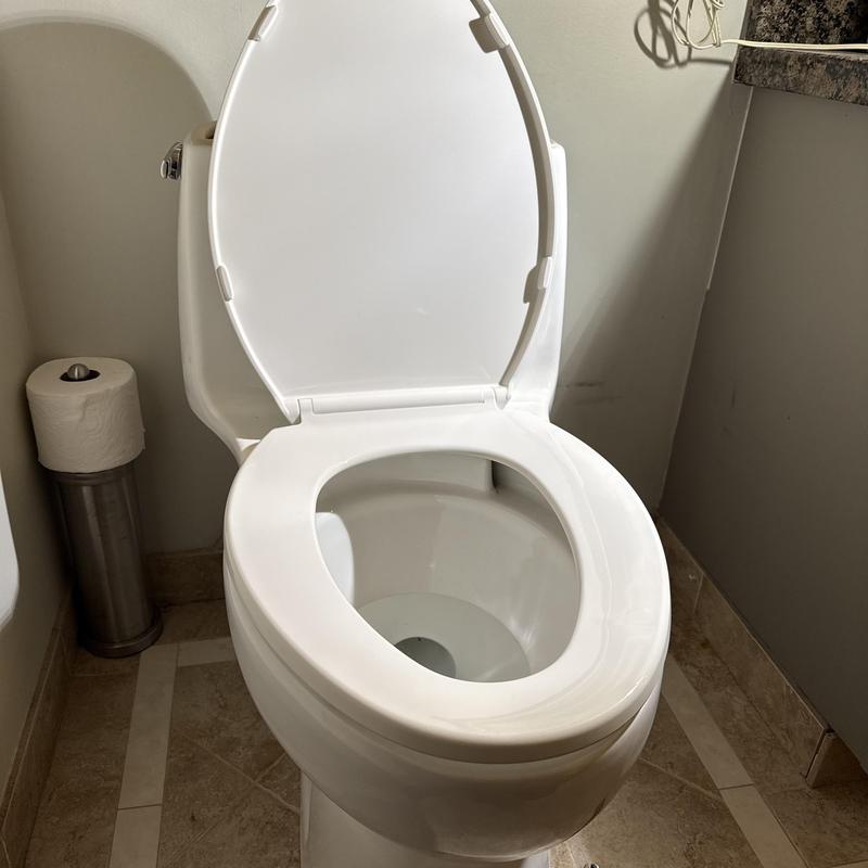 One-piece toilet installation with wax ring and caulk One-piece toilet installation with wax ring and caulk