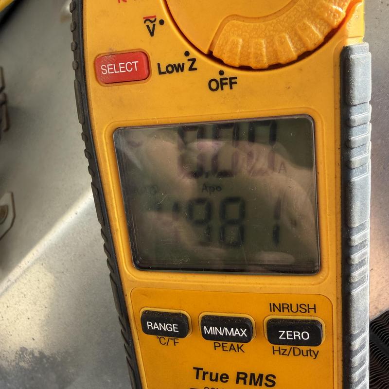 Digital clamp meter measuring electrical current