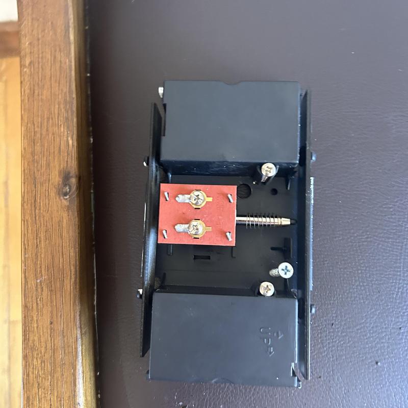 Doorbell chime unit showing internal electrical components