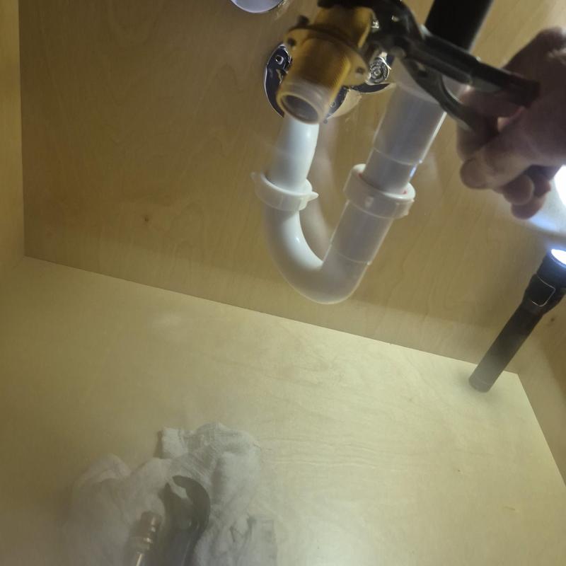 Faucet cartridge replacement with wrench under sink Faucet cartridge replacement with wrench under sink