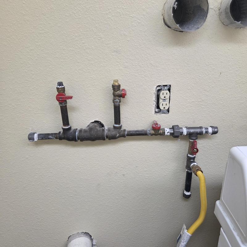 Dryer gas line installation with shutoff valves and outlet