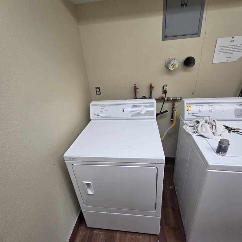 Clothes dryer installation in common laundry area