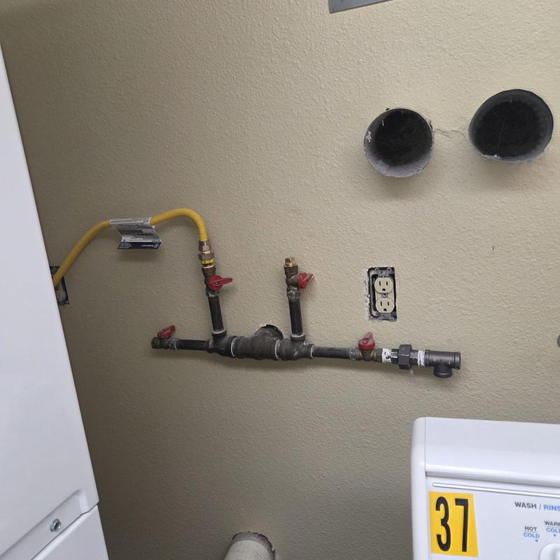 Dryer gas line and ventilation installation in common area