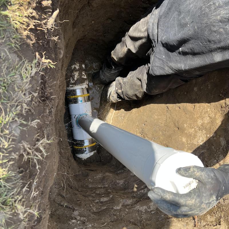 Two-way cleanout installation on underground pipe