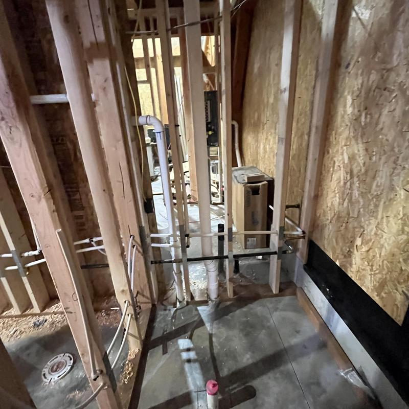 Water and sewer pipes installed in home framing walls