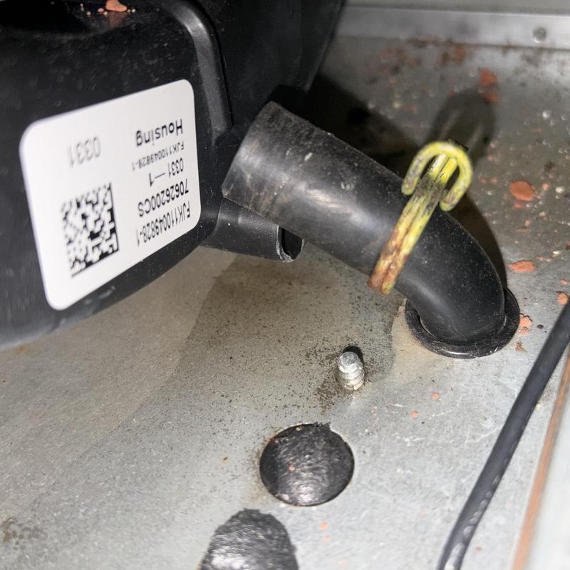 Furnace condensate drain line reconnected and secured