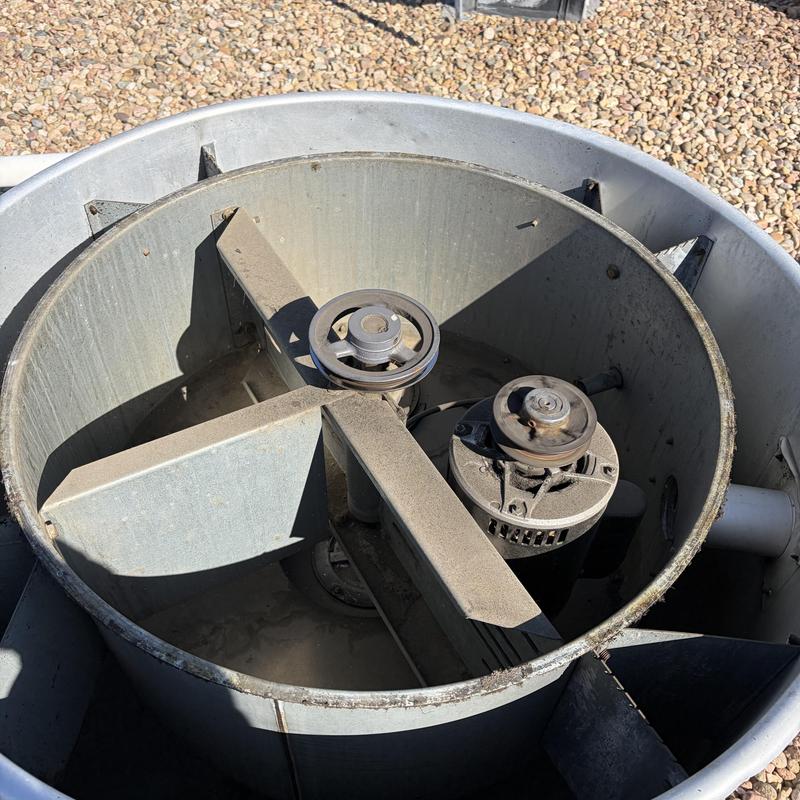 Oven vent fan assembly with motor pulleys and belts