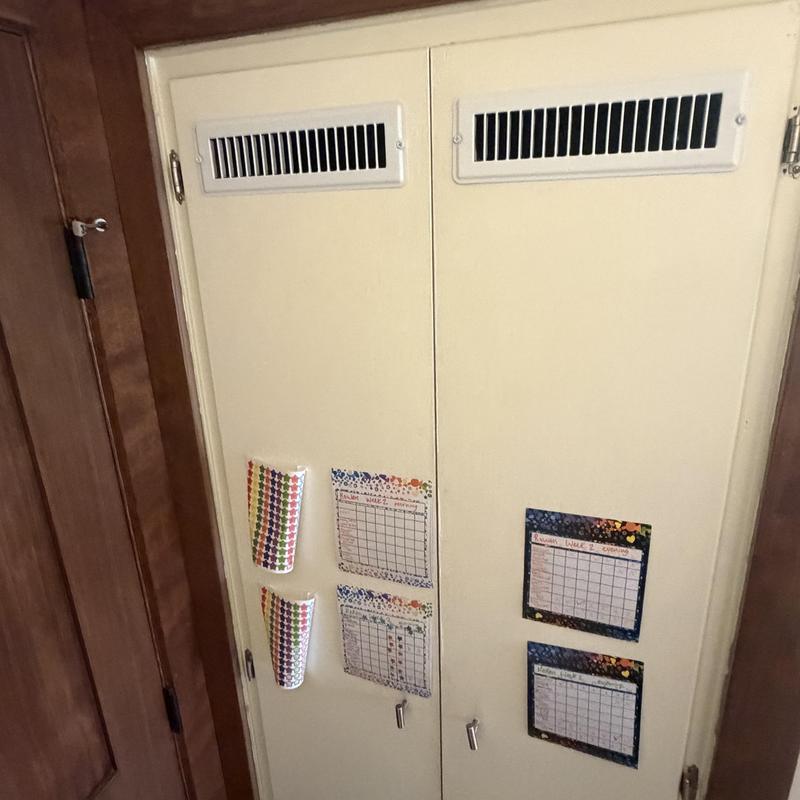 Water heater closet door with new ventilation grilles