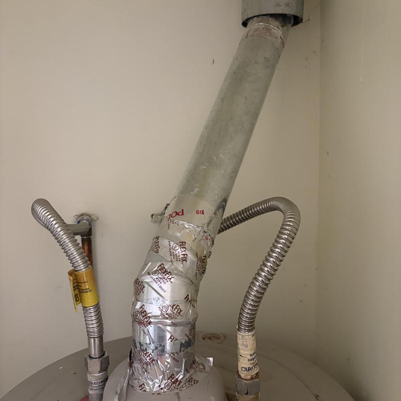 Gas water heater vent pipe with flexible gas lines