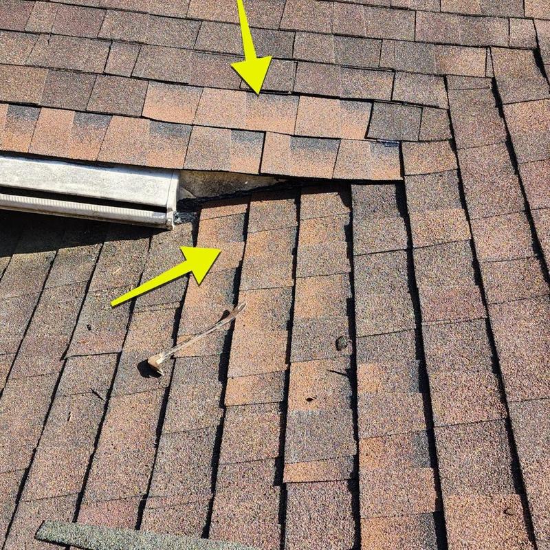 Storm damaged roof shingles near gutter edge in Spartanburg Storm damaged roof shingles near gutter edge in Spartanburg