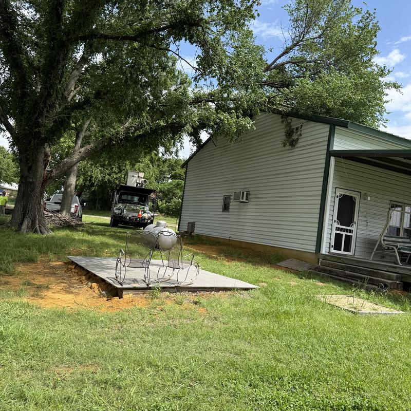 Tree limb removal from roof with rigging truck Tree limb removal from roof with rigging truck