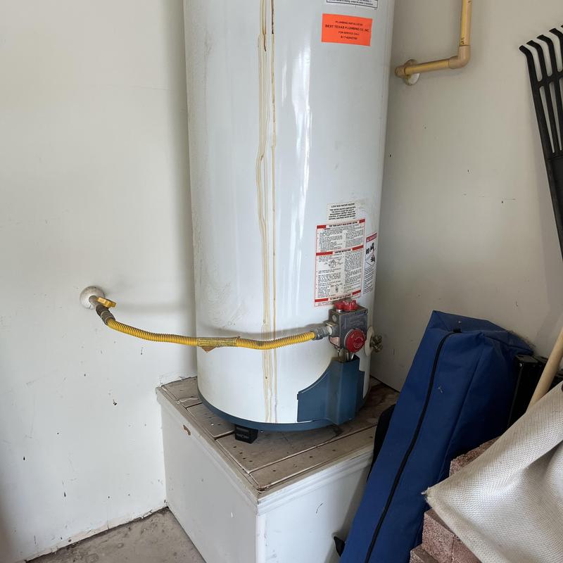 Bradford White gas water heater installation in garage