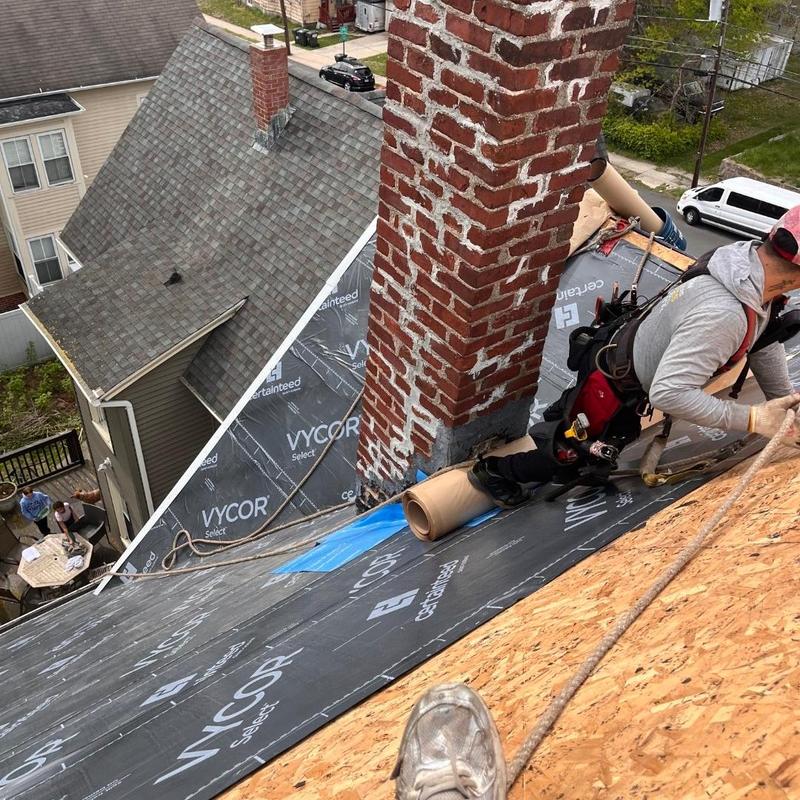 Chimney lead flashing installation on new roof deck