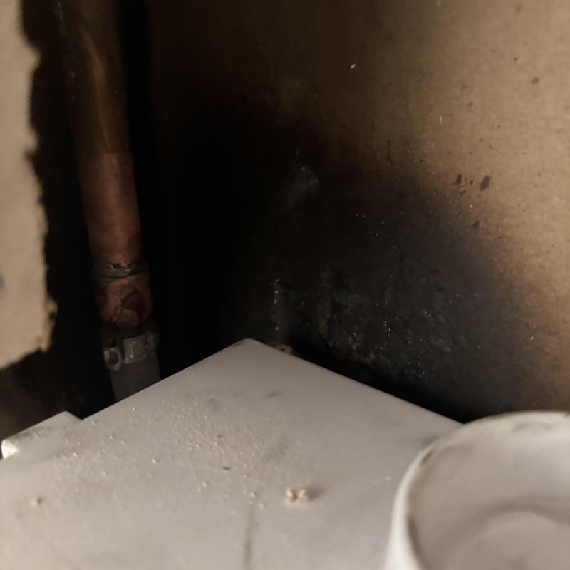 Washer box with fire damage and copper piping