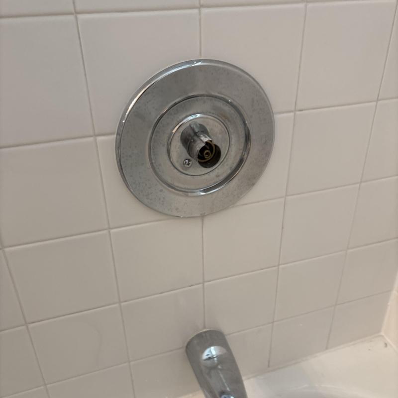 Shower valve handle missing on tiled wall Shower valve handle missing on tiled wall