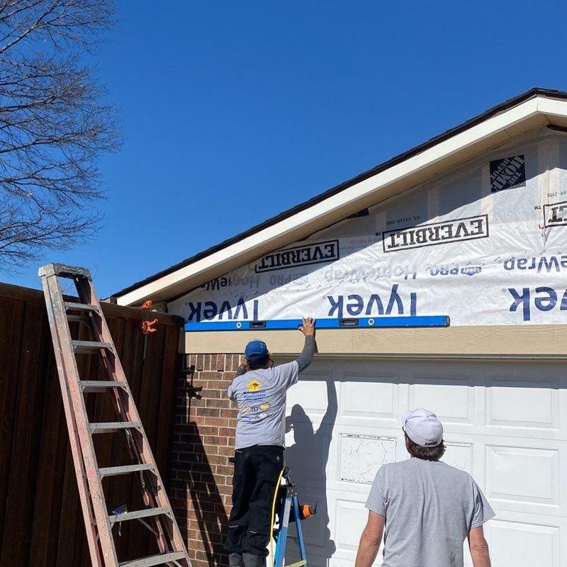 LP SmartSide siding and trim installation over garage