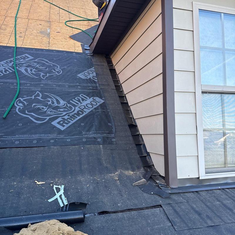 Roof underlayment installation near dormer window