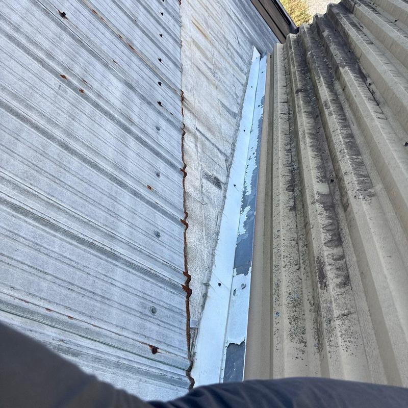 Metal roof panel rust damage and wear inspection