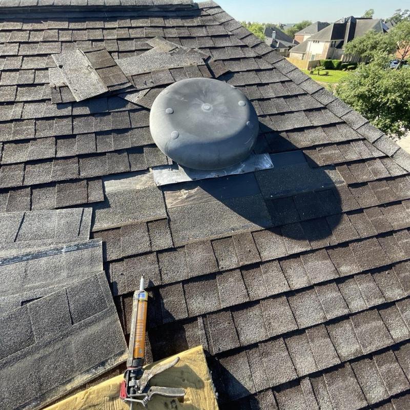 Roof vent flashing with new shingles installation