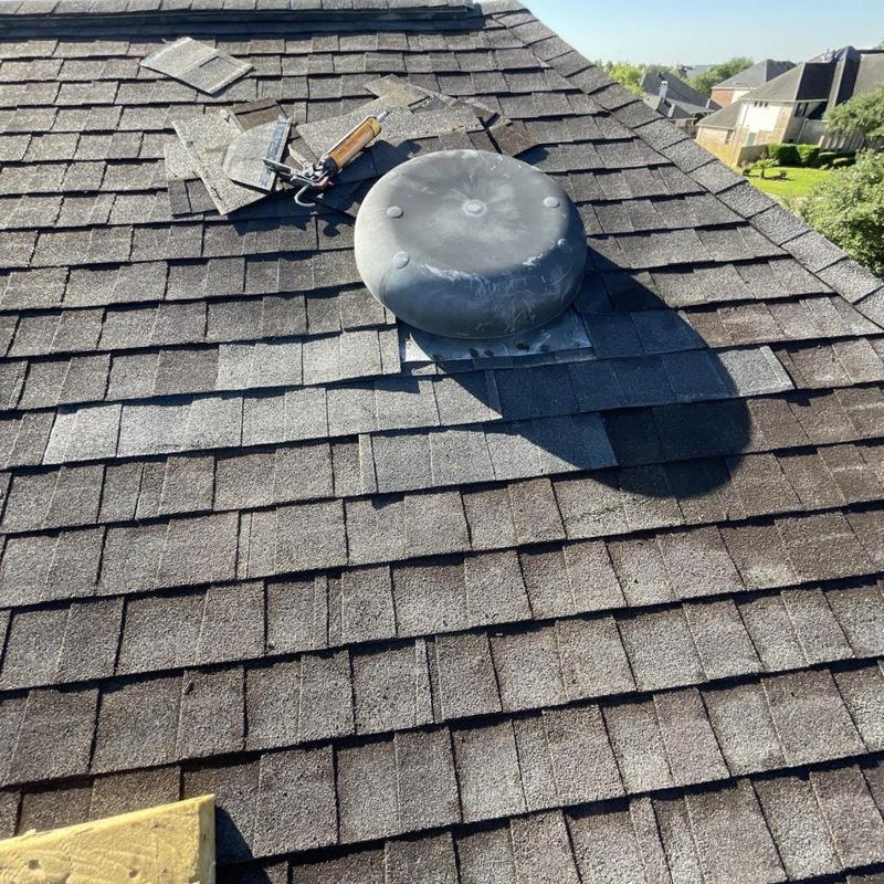 Roof vent flashing and shingle replacement on roof