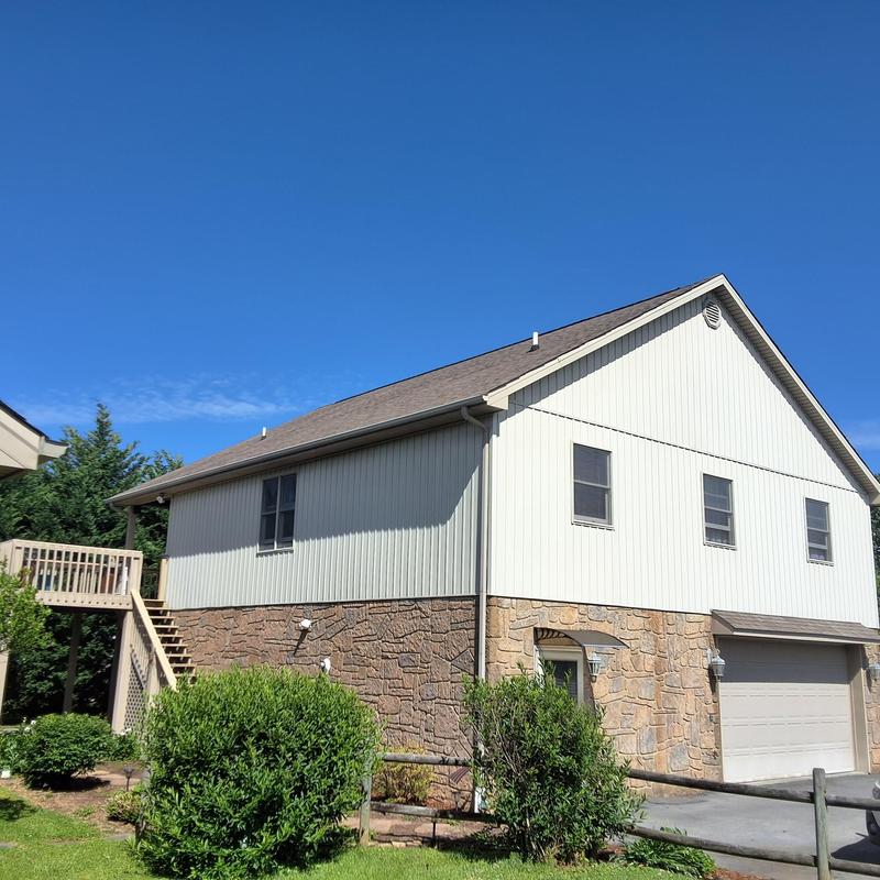 Asphalt shingle roof inspection on residential home Asphalt shingle roof inspection on residential home