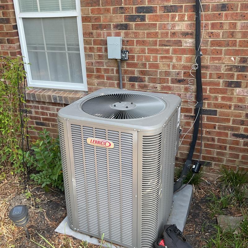 Lennox outdoor AC condenser with electrical check