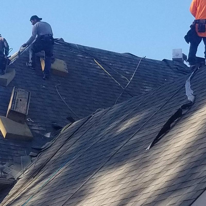 CertainTeed Landmark Pro shingles roof with workers installing