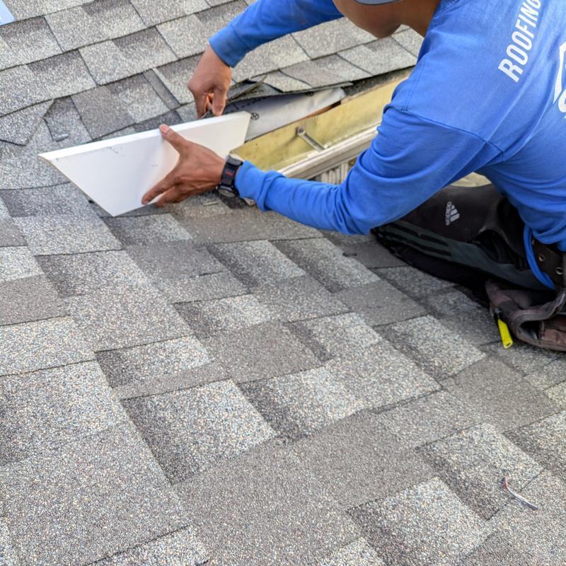 Roof vent installation on GAF HDZ weathered wood shingles