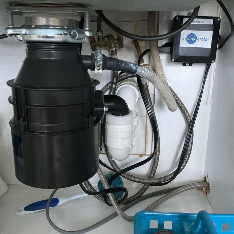 Insinkerator garbage disposal installation under sink