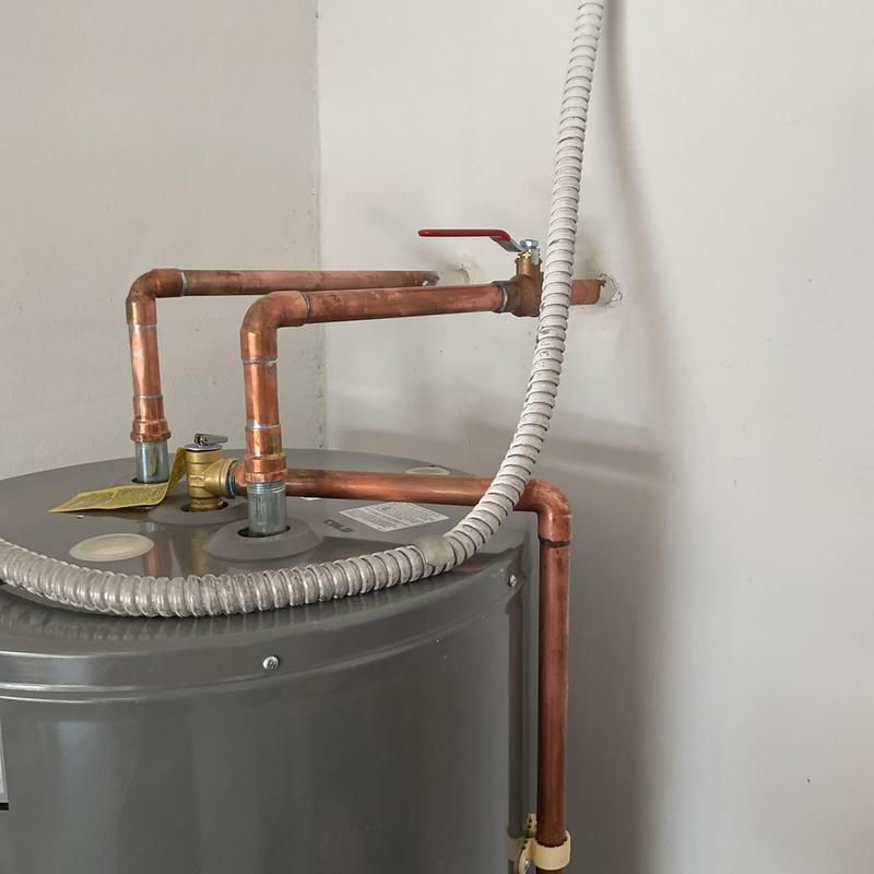 Rheem 50-gallon electric water heater with copper piping