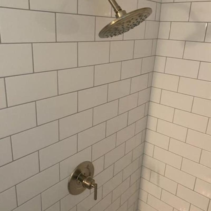 Shower valve and rain showerhead installation in tiled wall