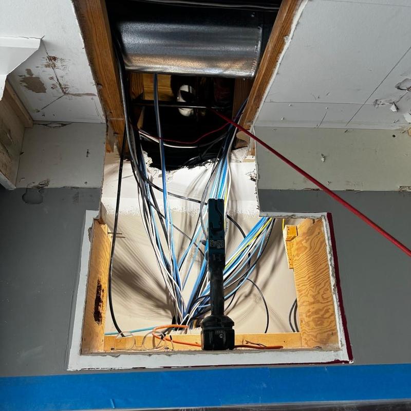 Electrical wiring setup inside ceiling access panel