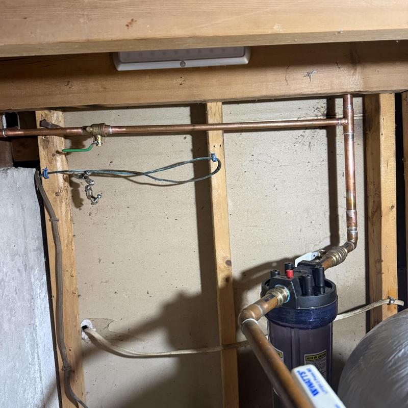 Outdoor faucet and main water filter system in basement Outdoor faucet and main water filter system in basement