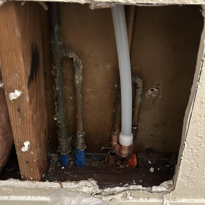34 PEX line installation behind drywall section