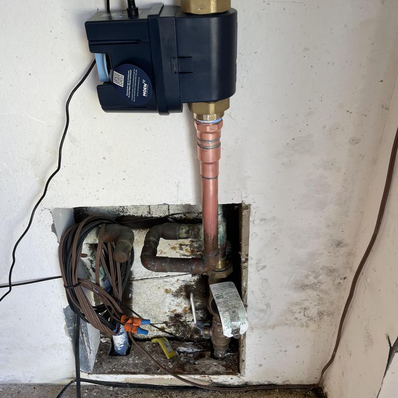 MOEN Flo smart water shutoff system on copper pipe