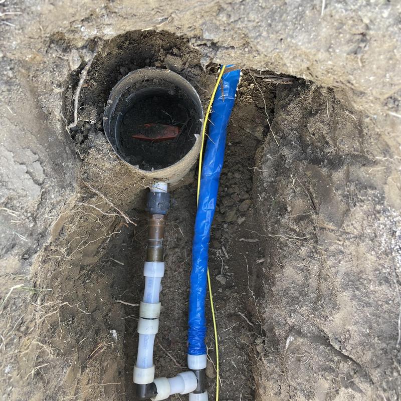1-inch PEX water line installation underground in soil