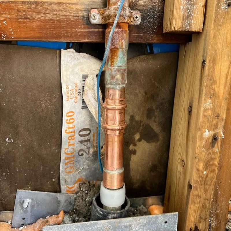 1-inch copper pipe riser with PEX brass adapter installation