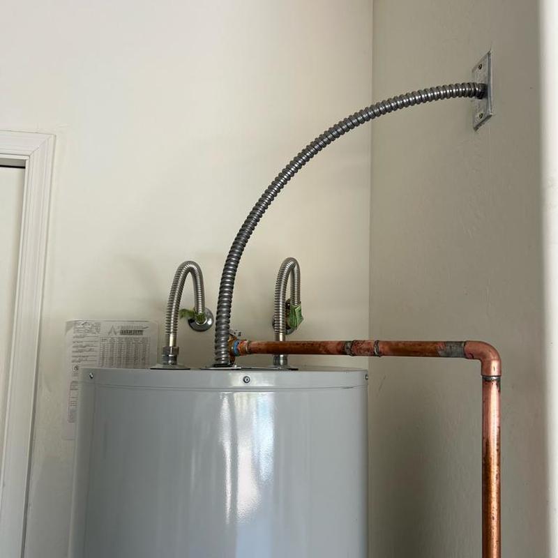 50-gallon electric water heater with copper piping