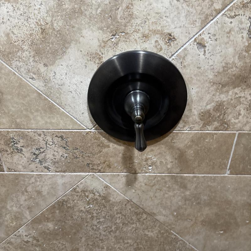 Price Pfister shower valve handle on tiled wall Price Pfister shower valve handle on tiled wall