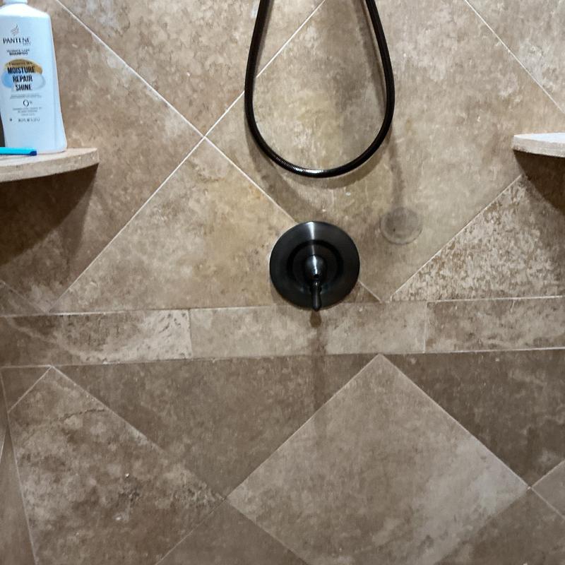 Price Pfister shower valve dripping in tiled shower Price Pfister shower valve dripping in tiled shower