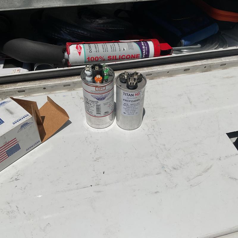 AC motor capacitors with silicone sealant tube