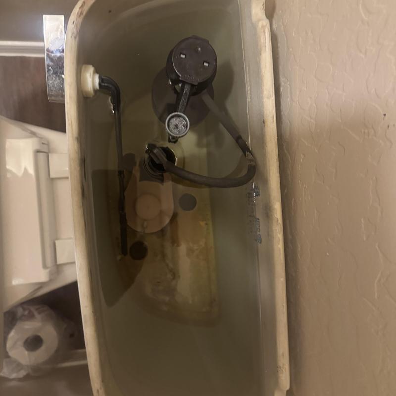 Toilet fill valve inside tank with water flow Toilet fill valve inside tank with water flow