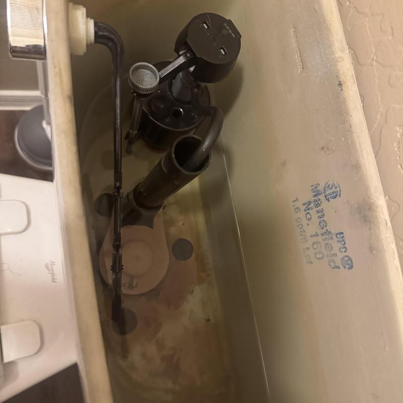 Toilet fill valve inside tank with water level Toilet fill valve inside tank with water level