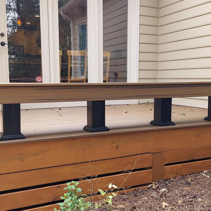 Composite deck railing and wood skirting installation
