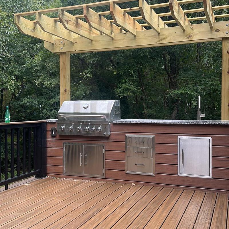 Outdoor kitchen grill and countertop with pergola
