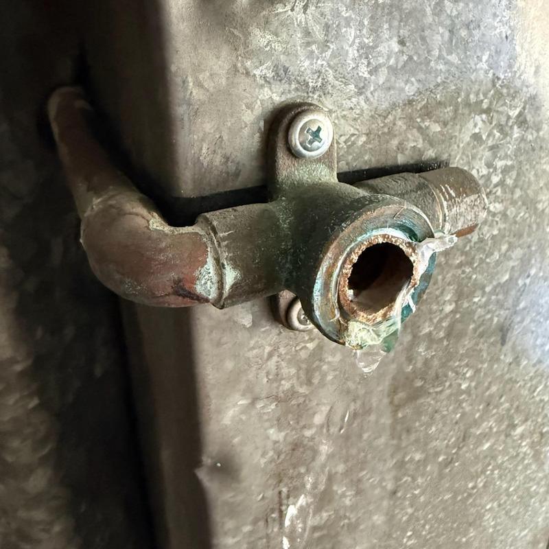 Corroded broken hose bib with water leak Corroded broken hose bib with water leak